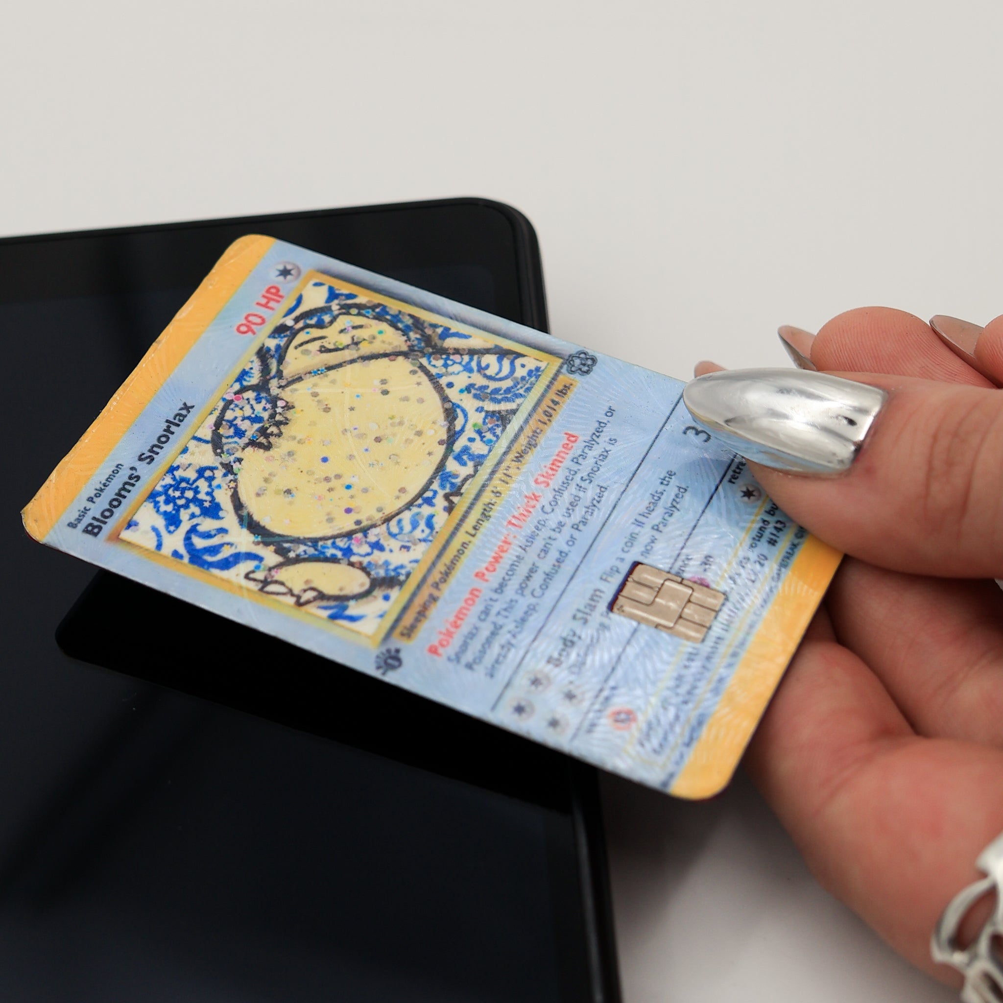Blooms "Porcelain Snorlax" Holographic Credit Card Cover
