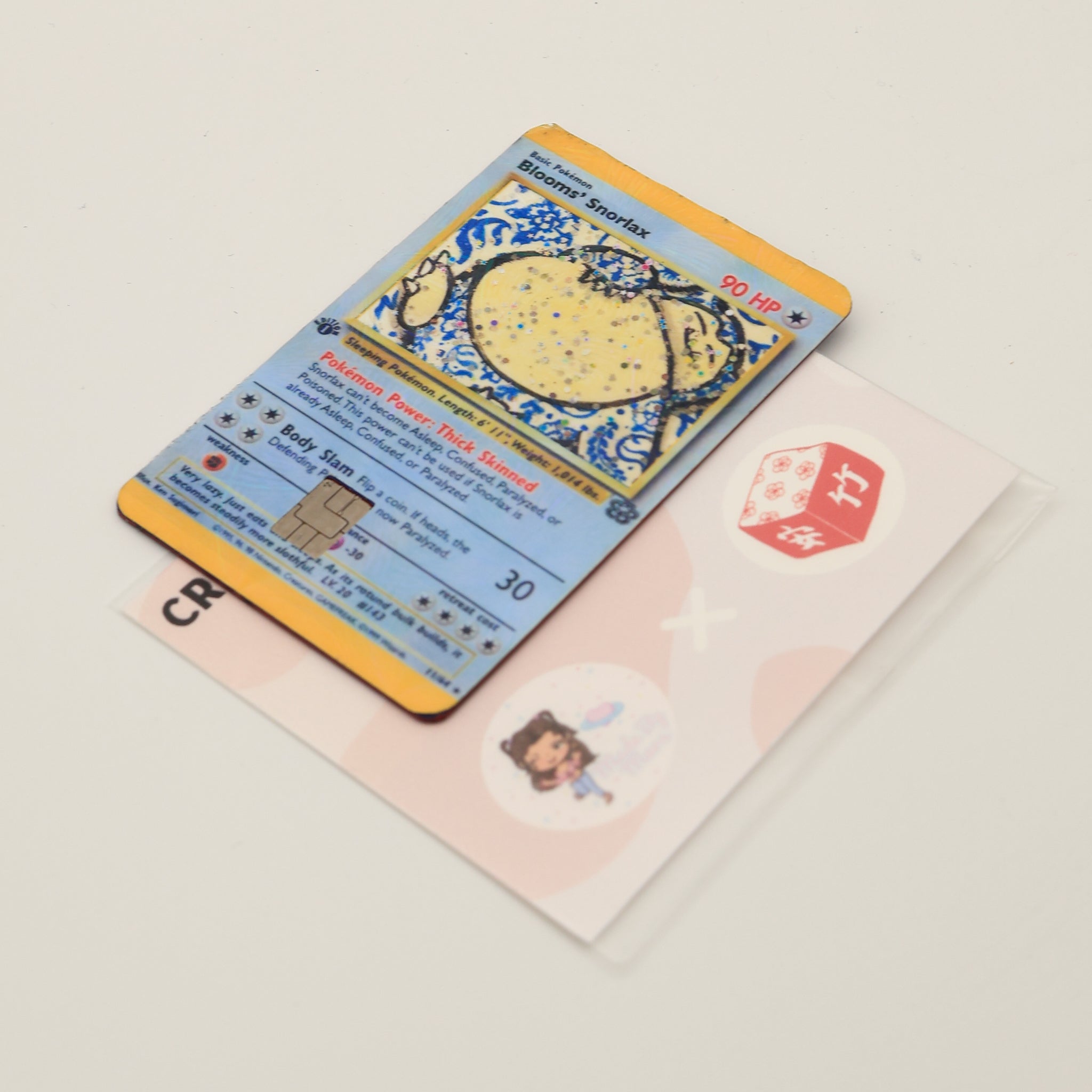 Blooms "Porcelain Snorlax" Holographic Credit Card Cover
